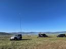 Trout Creek, Utah, about 90 miles east of Salt Lake City at Strawberry Reservoir. John Sager, WJ7S, is the “small” operator next to the RV. [Photo courtesy of John Mitton, KK7L].